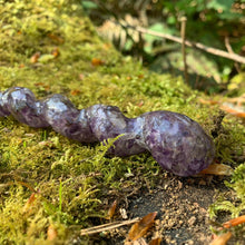 Load image into Gallery viewer, A stunning handcrafted unicorn magic wand made with shimmering amethyst chips, showcasing a blend of purple hues. The wand has a gracefully tapered shaft that sparkles in light, showcasing its intricate craftsmanship. Perfect for fantasy collectors, this wand embodies elegance and enchantment, making it a prized addition to any magical assortment.