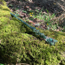 Load image into Gallery viewer, A stunning handcrafted Flora magic wand made with shimmering aventurine chips, showcasing a blend of green hues. The wand has a gracefully tapered shaft that sparkles in light, showcasing its intricate craftsmanship. Perfect for fantasy collectors, this wand embodies elegance and enchantment, making it a prized addition to any magical assortment.