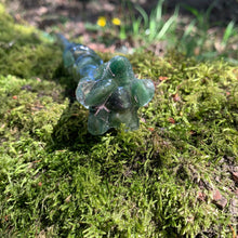 Load image into Gallery viewer, A stunning handcrafted Flora magic wand made with shimmering aventurine chips, showcasing a blend of green hues. The wand has a gracefully tapered shaft that sparkles in light, showcasing its intricate craftsmanship. Perfect for fantasy collectors, this wand embodies elegance and enchantment, making it a prized addition to any magical assortment.