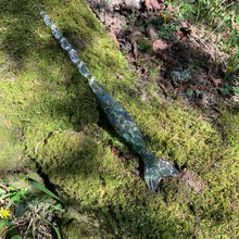 Load image into Gallery viewer, A stunning handcrafted Mertail magic wand made with shimmering aventurine chips, showcasing a blend of green hues. The wand has a gracefully tapered shaft that sparkles in light, showcasing its intricate craftsmanship. Perfect for fantasy collectors, this wand embodies elegance and enchantment, making it a prized addition to any magical assortment.