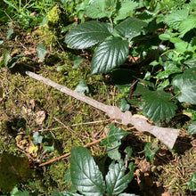 Load image into Gallery viewer, A stunning handcrafted Flora magic wand made with shimmering rose quartz chips, showcasing a blend of pink hues. The wand has a gracefully tapered shaft that sparkles in light, showcasing its intricate craftsmanship. Perfect for fantasy collectors, this wand embodies elegance and enchantment, making it a prized addition to any magical assortment.