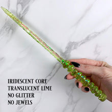 Lade das Bild in den Galerie-Viewer, A stunning lime green celestial-inspired Orbit design magic wand featuring a delicate, translucent design with iridescent shimmering accents. The wand has a beautiful handle with alternating hoops with a narrow shaft that sparkles in light, showcasing its intricate craftsmanship. Perfect for fantasy collectors, this wand embodies elegance and enchantment, making it a prized addition to any magical assortment.