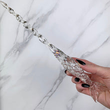 Lade das Bild in den Galerie-Viewer, A stunning clear Mertail, Mermaid inspired magic wand featuring a delicate, translucent design with iridescent shimmering accents. The wand has a beautiful fishtail shaped base with a swirling shaft that sparkles in light, showcasing its intricate craftsmanship. Perfect for fantasy collectors, this wand embodies elegance and enchantment, making it a prized addition to any magical assortment.