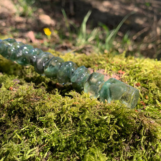 A unique handmade magic wand made with real green aventurine crystal chips, in the Orbit  Design. 