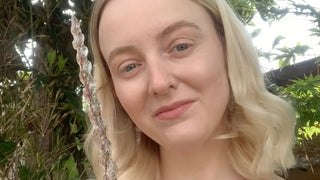 Photo of Grace from Grace from House of Wandcraft holding a wand 