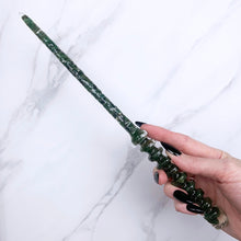 Charger l&#39;image dans la galerie, A stunning handcrafted Orbit magic wand made with shimmering aventurine chips, showcasing a blend of green hues. The wand has a gracefully tapered shaft that sparkles in light, showcasing its intricate craftsmanship. Perfect for fantasy collectors, this wand embodies elegance and enchantment, making it a prized addition to any magical assortment.
