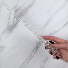 Lade das Bild in den Galerie-Viewer, A stunning clear Twist design magic wand featuring a delicate, translucent design with iridescent shimmering accents. The wand has a beautiful twisted handle with with a narrow shaft that sparkles in light, showcasing its intricate craftsmanship. Perfect for fantasy collectors, this wand embodies elegance and enchantment, making it a prized addition to any magical assortment.
